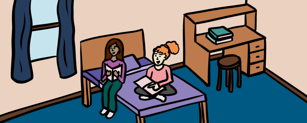 Two girls sitting on a bed together with a book